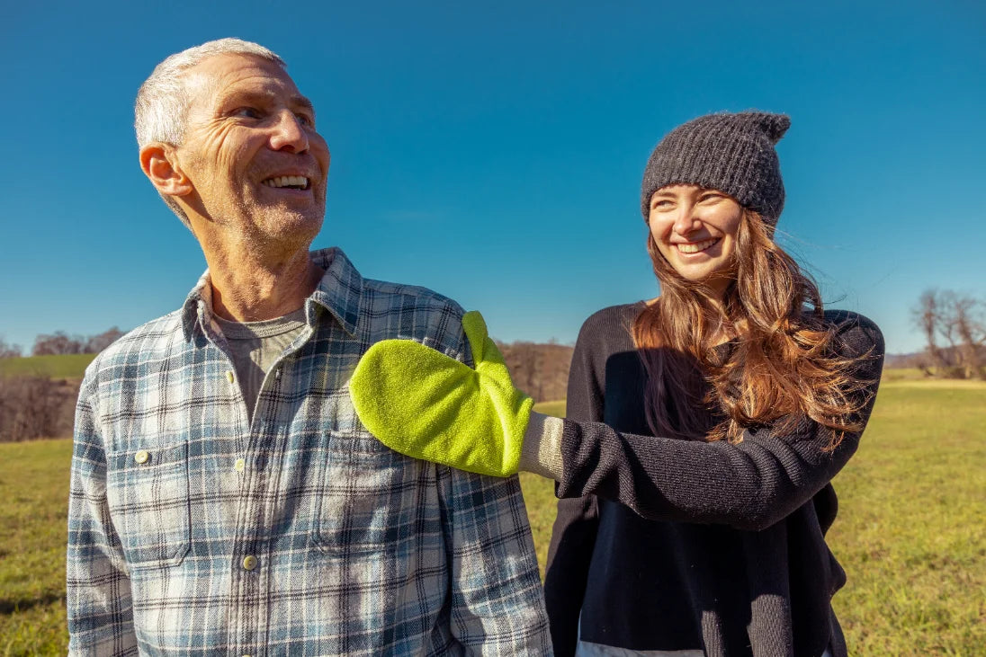 Steve & Olivia, the father-daughter founders, outdoors with their dog