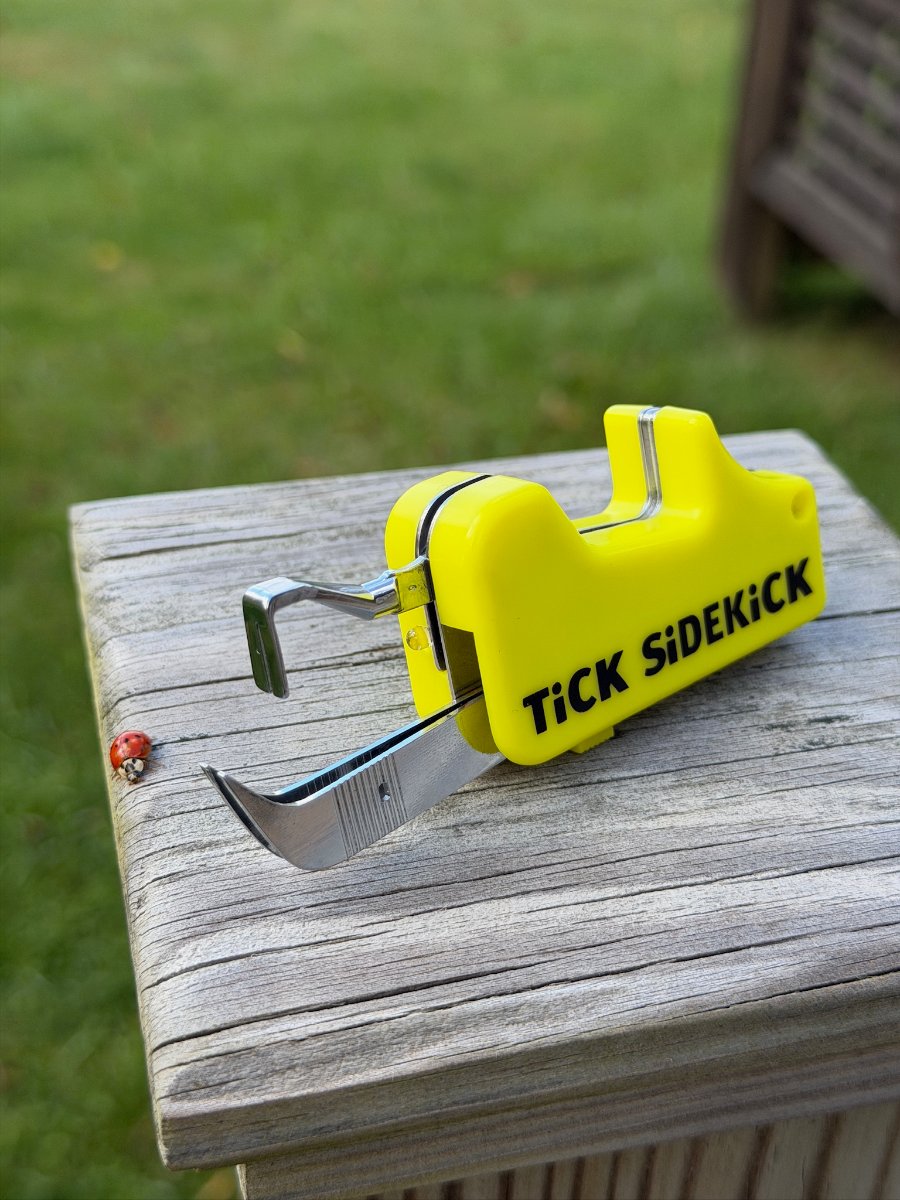 TiCK SiDEKiCK open on a garden bench
