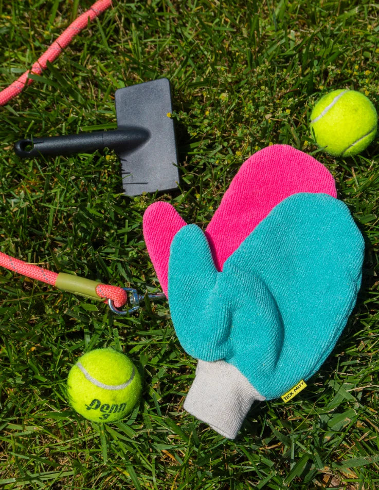 Close-up of the mitt catching a tick on the fabric